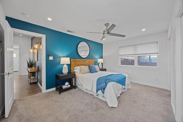 bedroom featuring recessed lighting, baseboards, visible vents, and carpet flooring