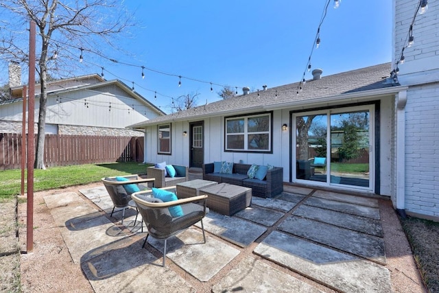 view of patio / terrace with an outdoor hangout area and fence