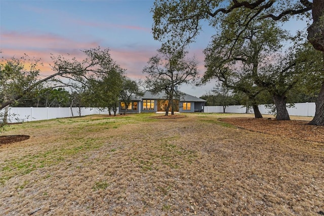 view of yard featuring a fenced backyard