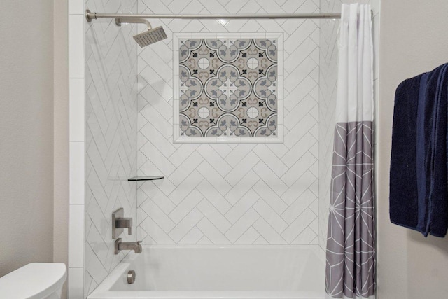 bathroom with shower / tub combo with curtain and toilet