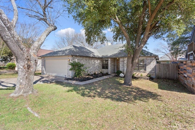 ranch-style home featuring an attached garage, brick siding, fence, driveway, and a front lawn