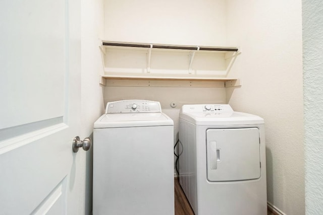 washroom with laundry area and washing machine and dryer