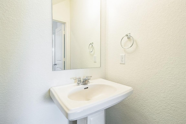 6500 Cetone Ter, Round Rock, TX 78665 - bathroom with a sink and a textured wall