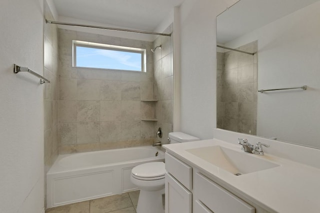 full bath with  shower combination, vanity, toilet, and tile patterned floors