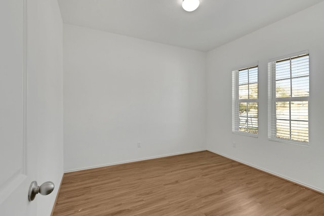 empty room with light wood-style flooring