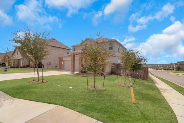 view of front facade featuring stucco siding, fence, a garage, driveway, and a front lawn