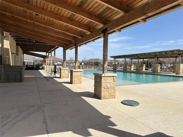 pool featuring a patio area