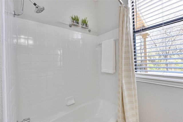 full bath with shower / bath combination with curtain