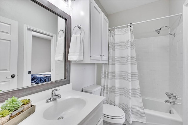 full bath featuring shower / tub combo, ensuite bath, vanity, and toilet