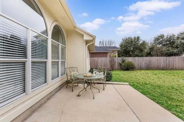 view of patio / terrace with fence