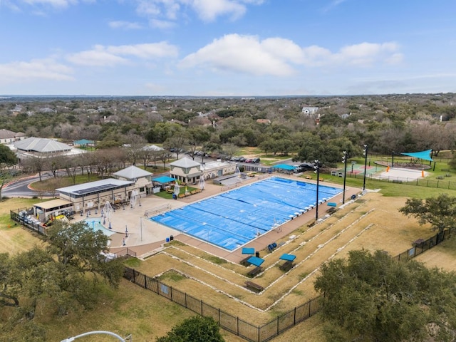 view of swimming pool with an enclosed area and fence