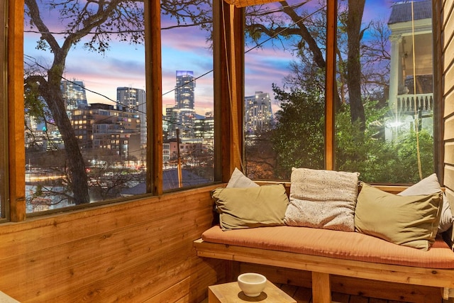 unfurnished sunroom with a view of city