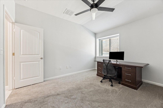 home office with vaulted ceiling, a ceiling fan, baseboards, carpet flooring, and visible vents