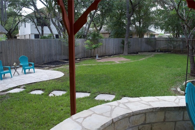 view of yard featuring a fenced backyard and a patio