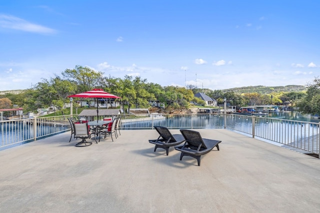 view of patio / terrace featuring a water view