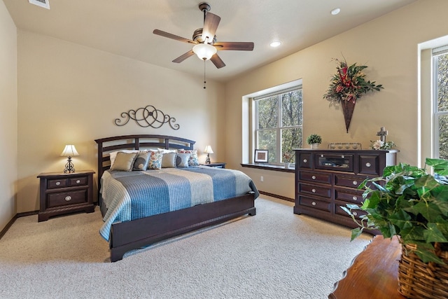 bedroom featuring visible vents, baseboards, a ceiling fan, carpet floors, and recessed lighting