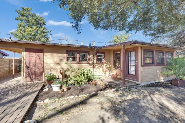 view of front of house featuring a deck