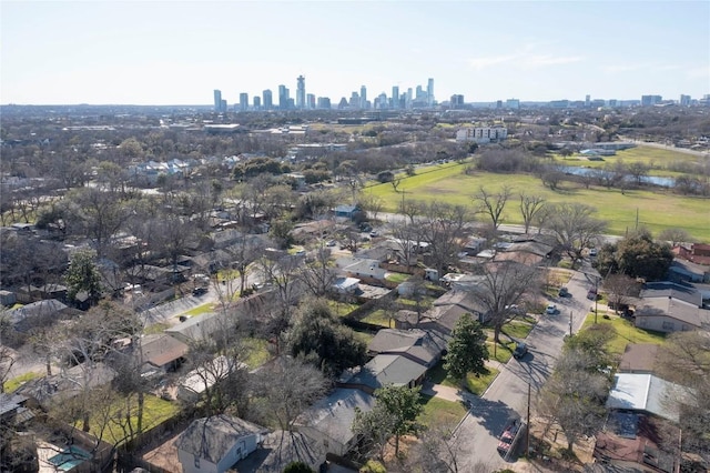 birds eye view of property with a view of city