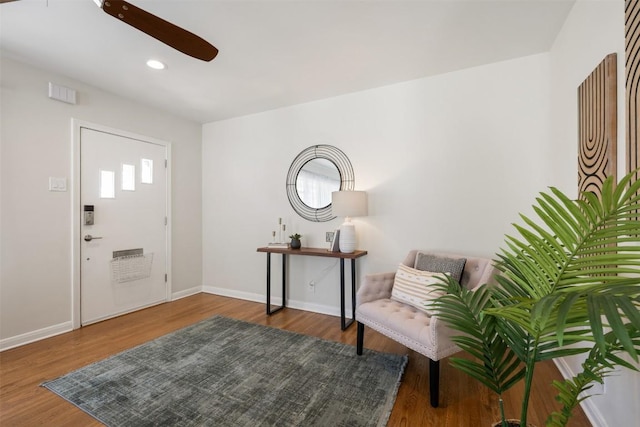 entryway with ceiling fan, baseboards, wood finished floors, and recessed lighting