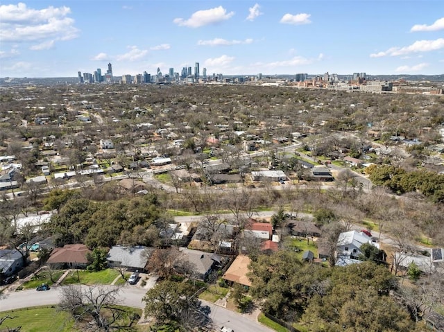 birds eye view of property with a city view