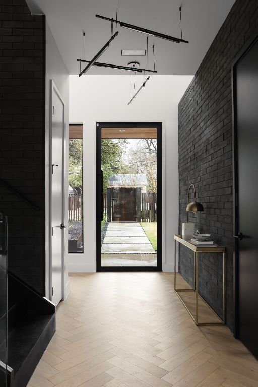 1704 Newton St, Austin, TX 78704 - entryway featuring wood finished floors and a towering ceiling