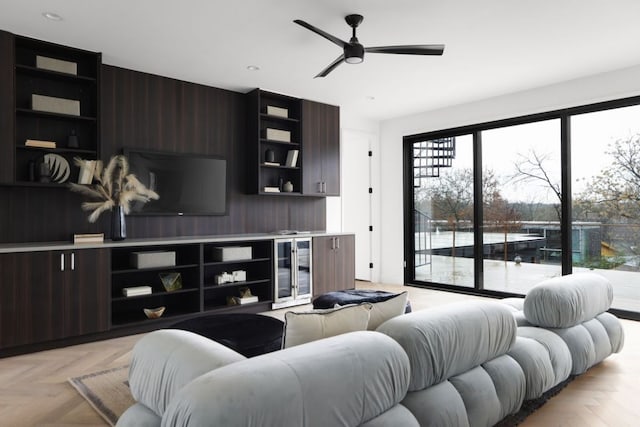 living area with a ceiling fan, wine cooler, and recessed lighting