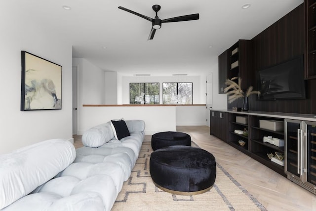 living room with a ceiling fan and recessed lighting