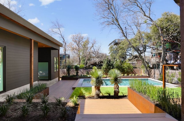 exterior space with a fenced backyard and a fenced in pool