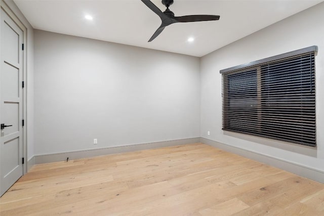 empty room featuring recessed lighting, baseboards, ceiling fan, and wood finished floors