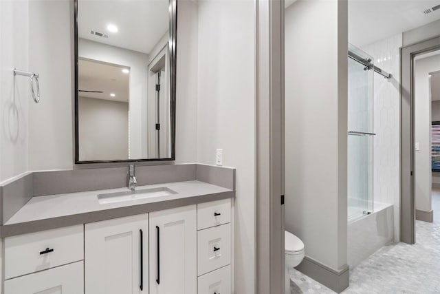 bathroom featuring vanity,  shower combination, toilet, and visible vents