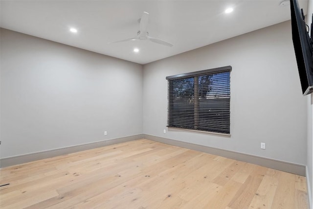 unfurnished room featuring recessed lighting, baseboards, light wood-style floors, and a ceiling fan