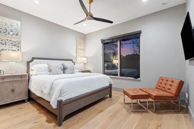 bedroom with recessed lighting, baseboards, light wood finished floors, and ceiling fan