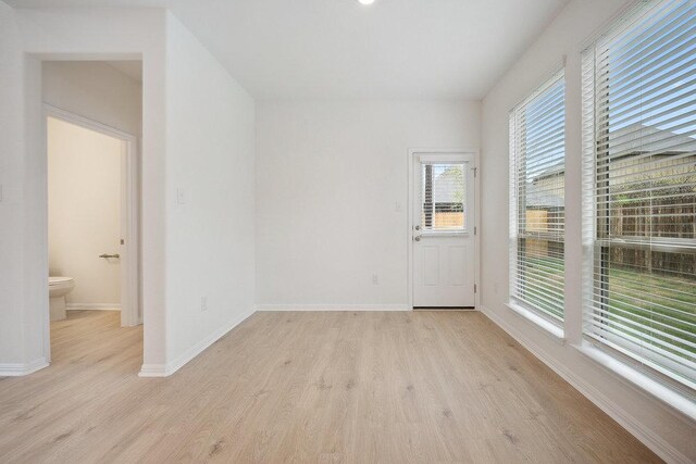 13224 Ditka Dr, Austin, TX 78652 - spare room featuring light wood-style flooring and baseboards