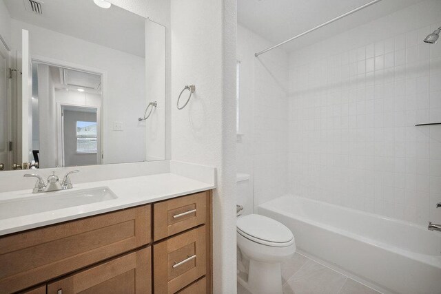 13224 Ditka Dr, Austin, TX 78652 - full bath with toilet, vanity,  shower combination, and tile patterned floors