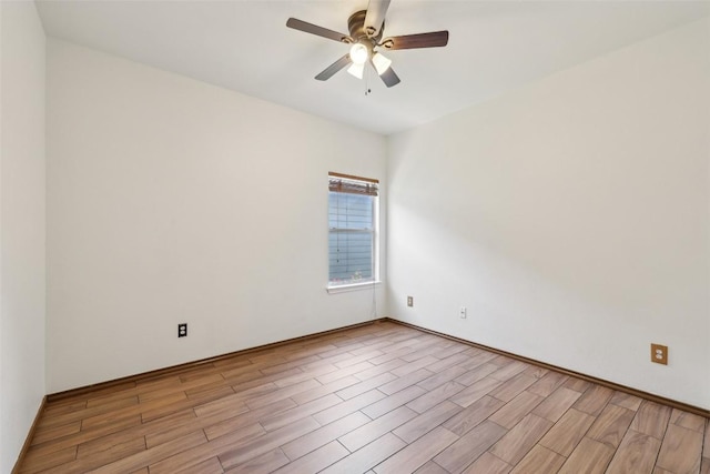 9316 Brents Elm Dr, Austin, TX 78744 - spare room with light wood finished floors and ceiling fan