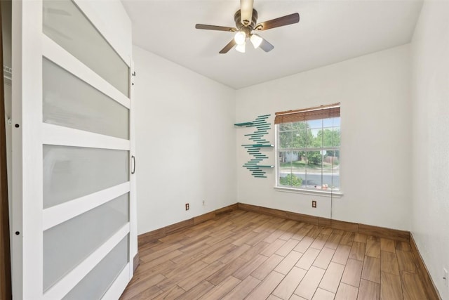 9316 Brents Elm Dr, Austin, TX 78744 - unfurnished room featuring a ceiling fan and wood finished floors