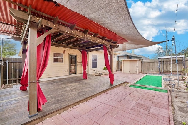 9316 Brents Elm Dr, Austin, TX 78744 - fenced backyard featuring a deck and a shed