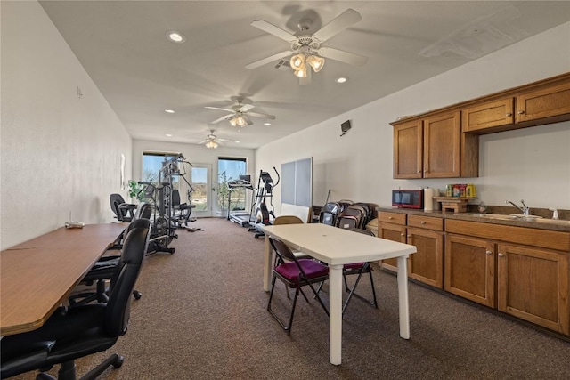130 Sobrante Rd Unit 309, Belton, TX 76513 - kitchen featuring dark carpet, brown cabinets, a sink, recessed lighting, and ceiling fan