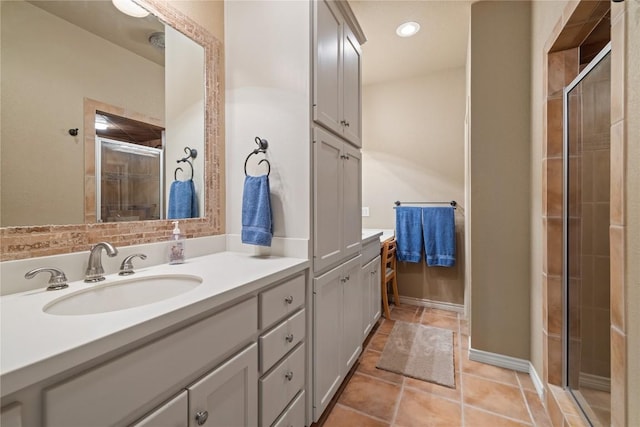 130 Sobrante Rd Unit 309, Belton, TX 76513 - bathroom with a shower stall, vanity, tile patterned flooring, and recessed lighting