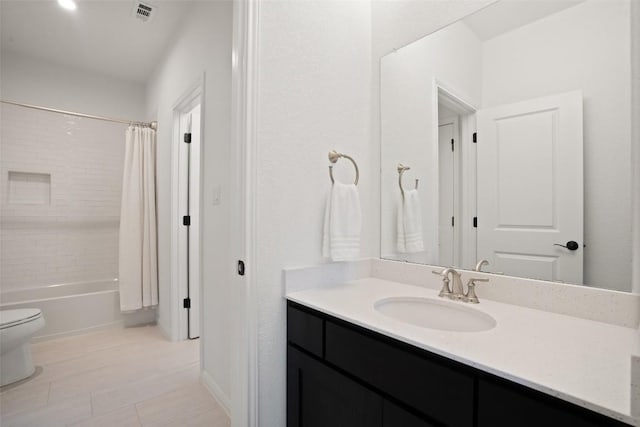 full bathroom featuring visible vents, toilet, shower / bathtub combination with curtain, tile patterned flooring, and vanity