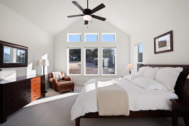 bedroom featuring a ceiling fan, high vaulted ceiling, and carpet flooring