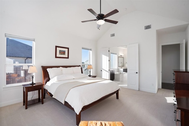 bedroom featuring high vaulted ceiling, light colored carpet, visible vents, and baseboards