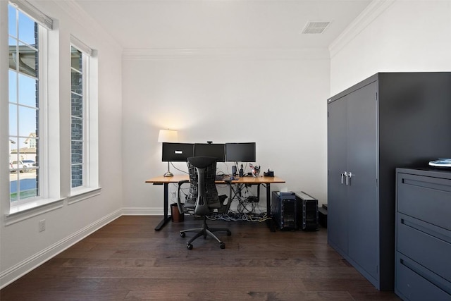 office featuring dark wood-style flooring, visible vents, crown molding, and baseboards