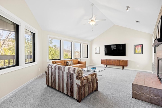 living room featuring carpet floors, visible vents, baseboards, vaulted ceiling, and a brick fireplace