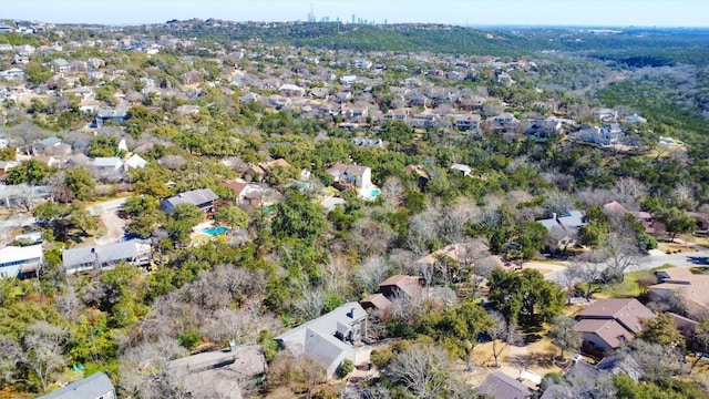 birds eye view of property with a residential view