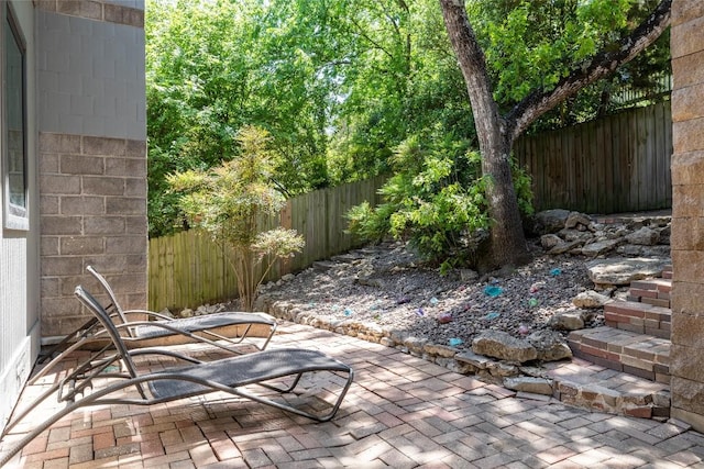 view of patio featuring a fenced backyard