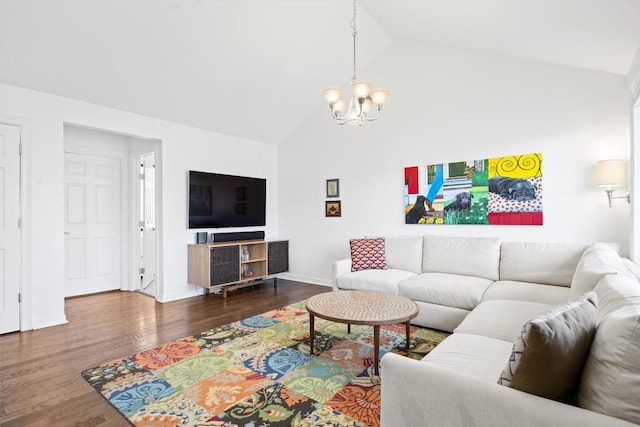 living room with an inviting chandelier, baseboards, high vaulted ceiling, and wood finished floors