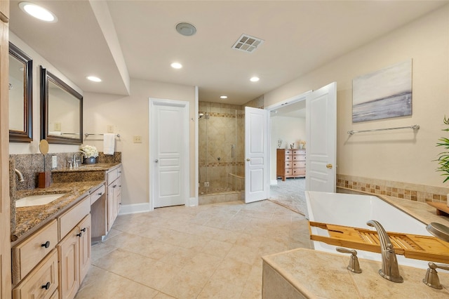 full bath featuring a bath, a stall shower, a sink, and visible vents