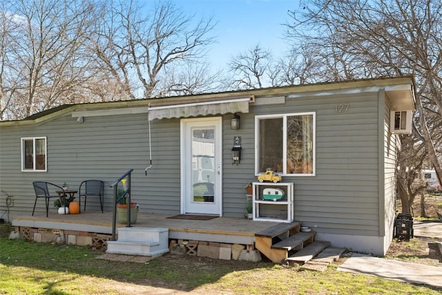 view of front of house with a wooden deck