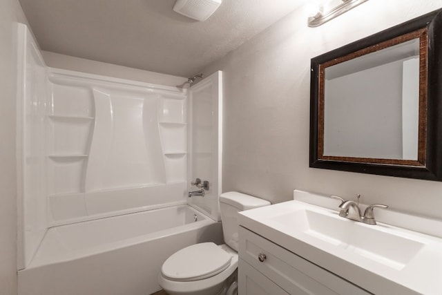 bathroom featuring visible vents, shower / bath combination, vanity, and toilet